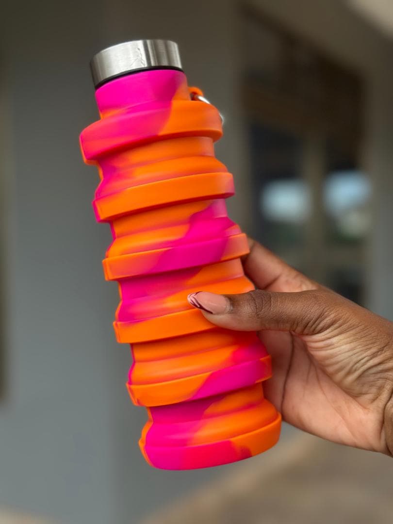 NAX foldable silicone water bottle in Pink & Orange Marble, expanded