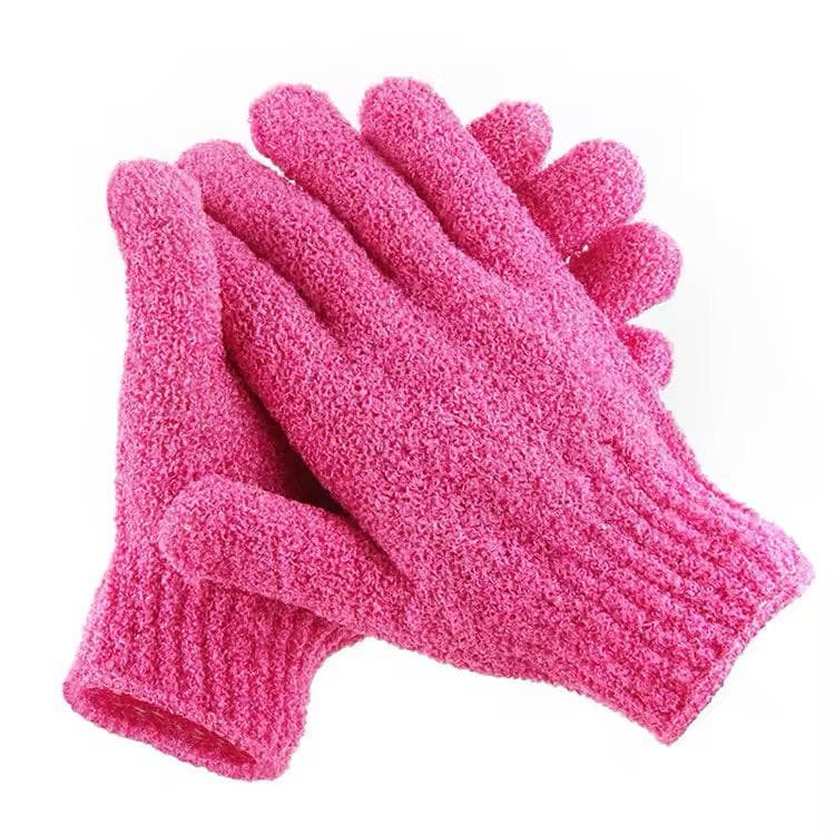 A pair of pink NAX exfoliating gloves